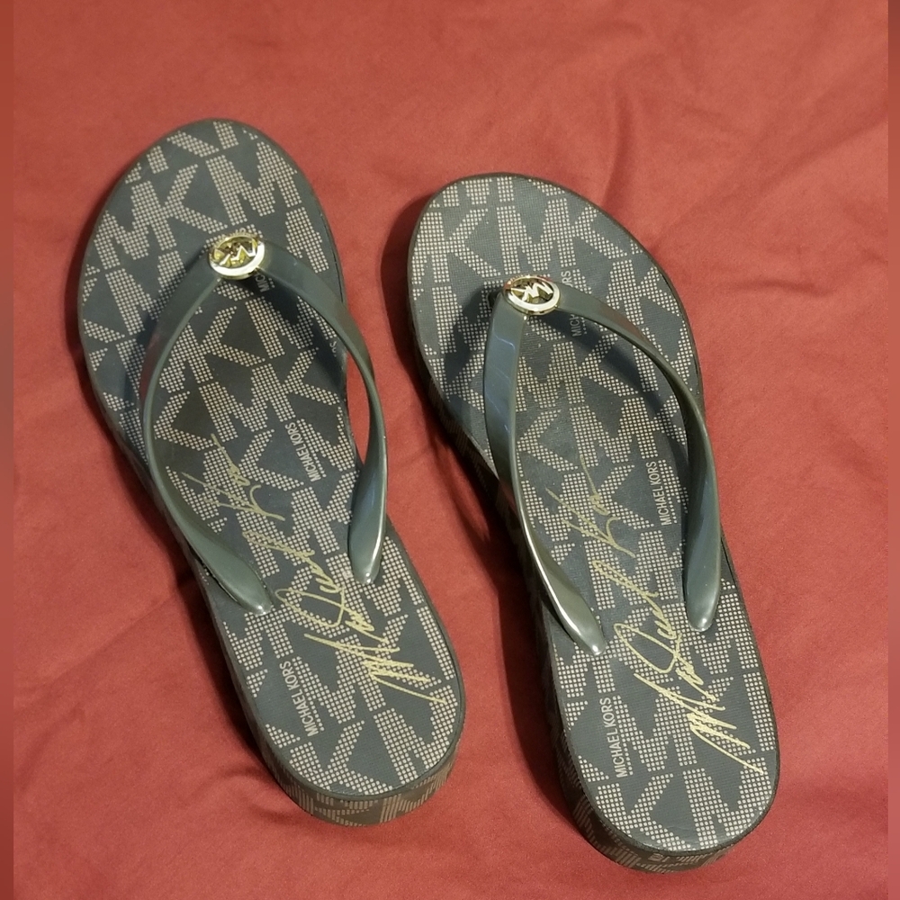 Michael Kors Monogrammed Flip Flops, NWOT, Size 9M